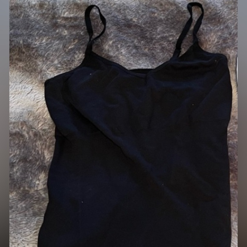 Skinny girl shaping camisole top